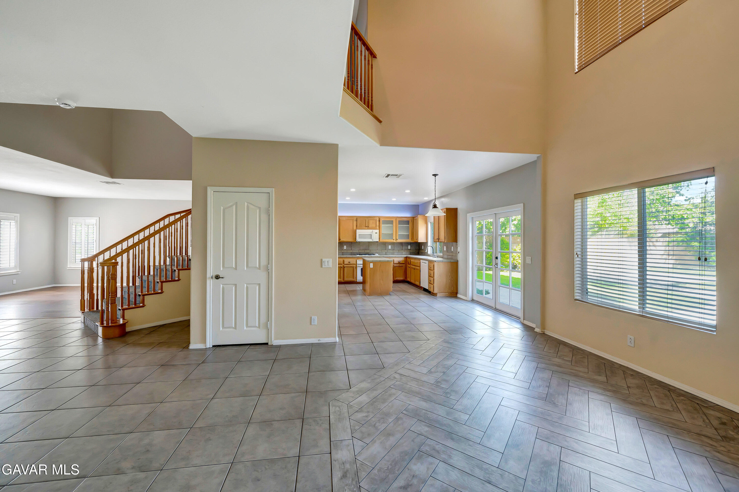 43826 Generation Avenue Lancaster, CA 93536 - Photo 15 of 61 a view of a hallway with furniture and a window