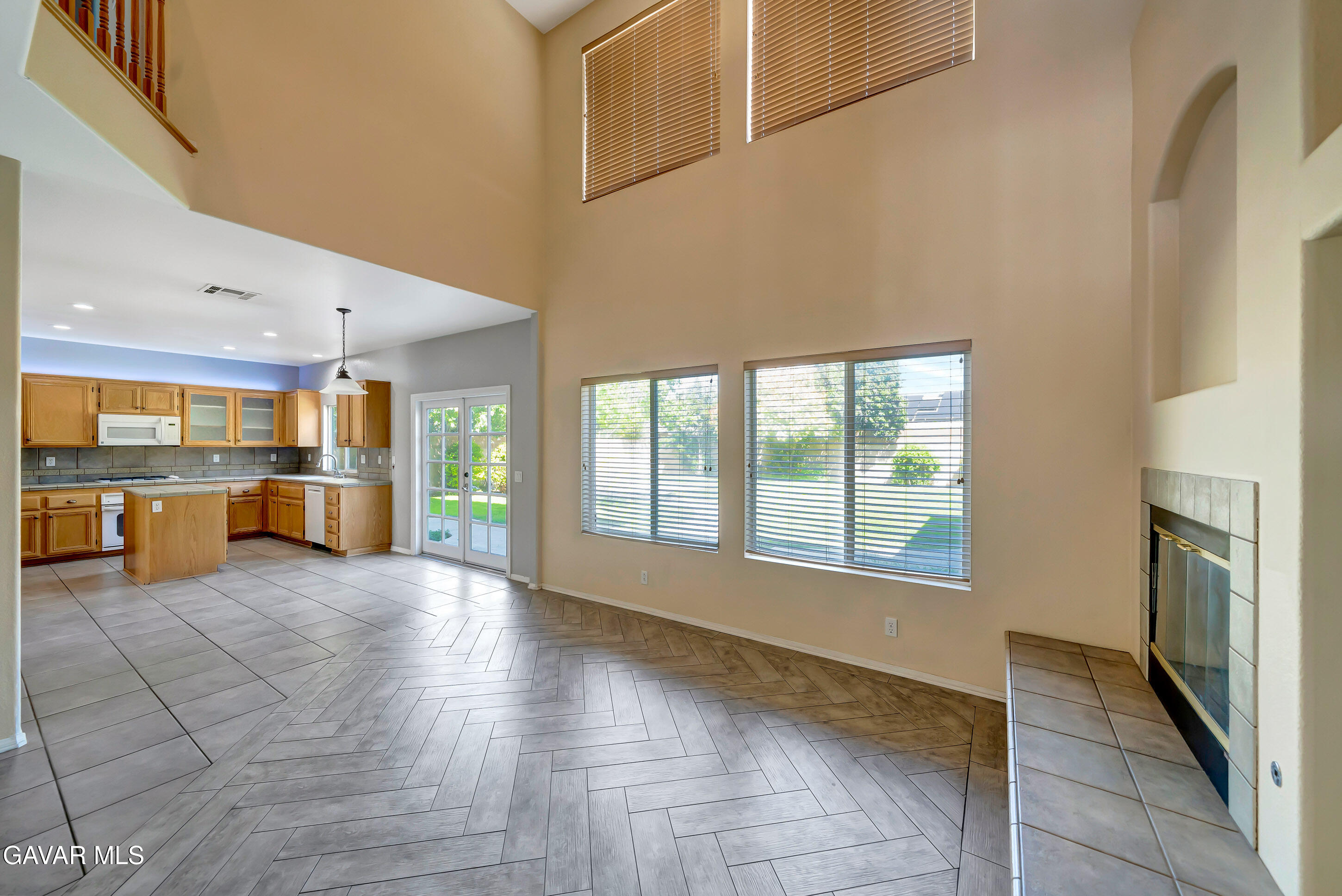43826 Generation Avenue Lancaster, CA 93536 - Photo 16 of 61 a view of a kitchen with a sink and a large window