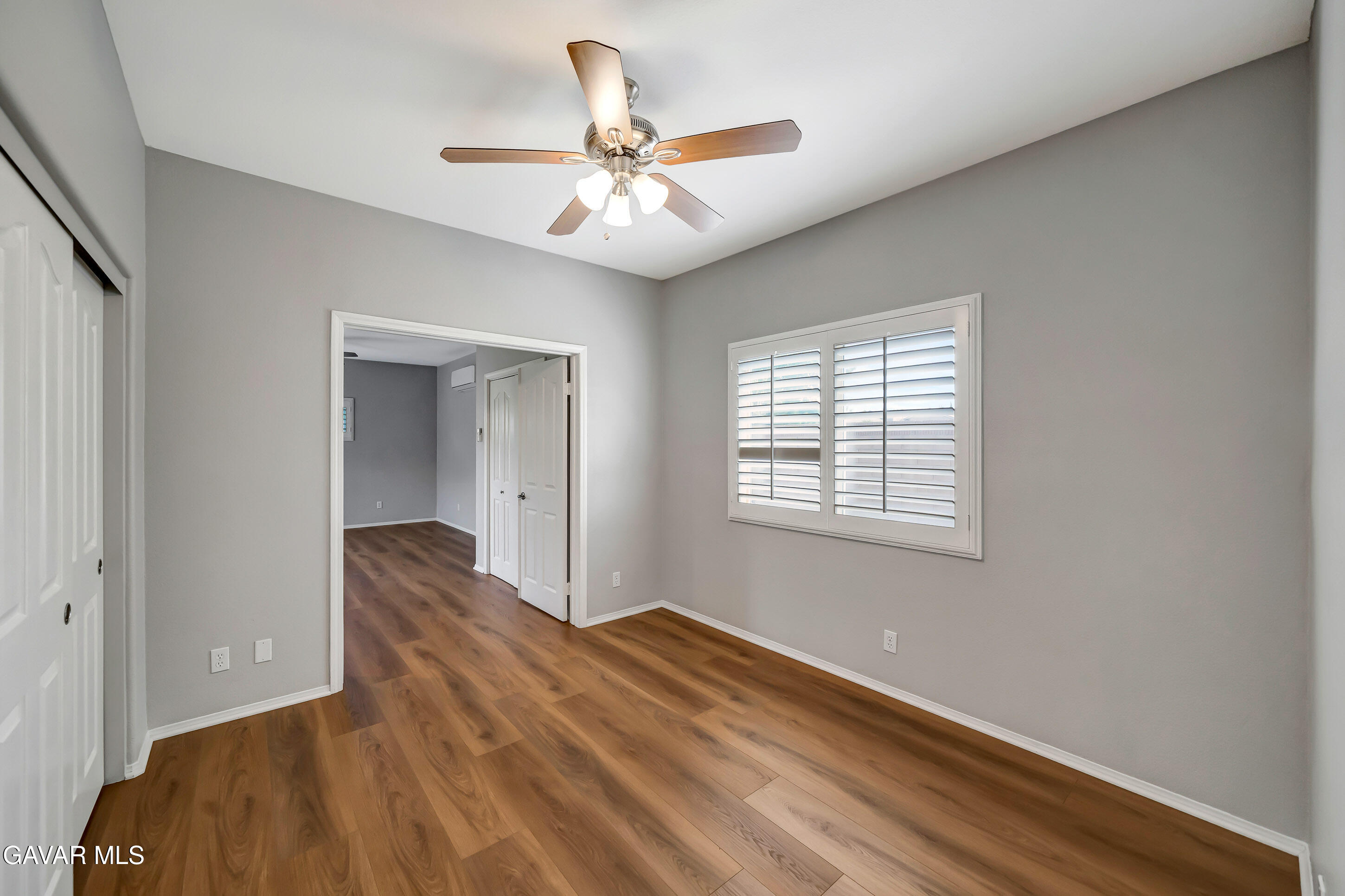 43826 Generation Avenue Lancaster, CA 93536 - Photo 27 of 61 a view of empty room with wooden floor