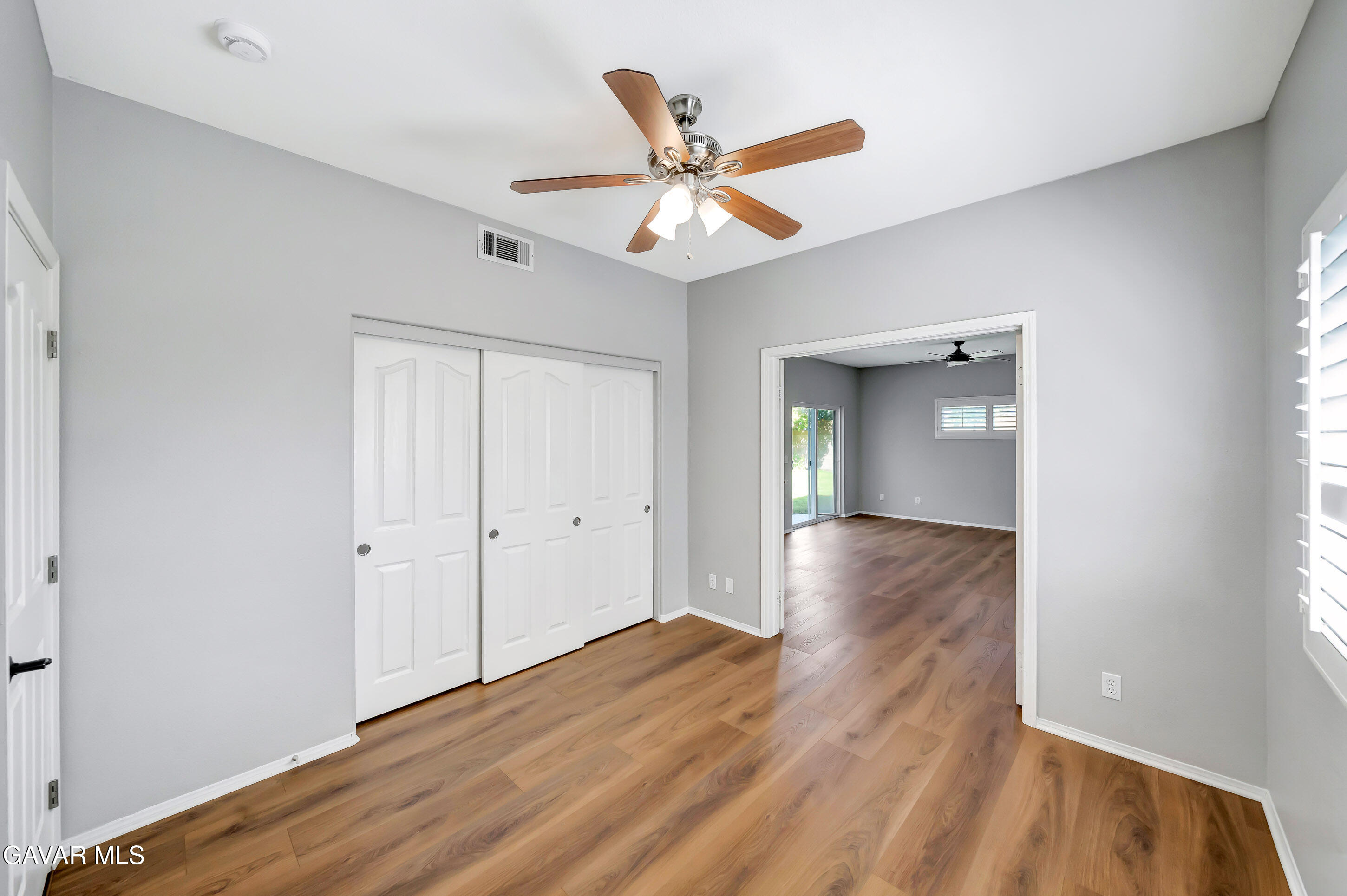 43826 Generation Avenue Lancaster, CA 93536 - Photo 28 of 61 a view of an empty room and wooden floor