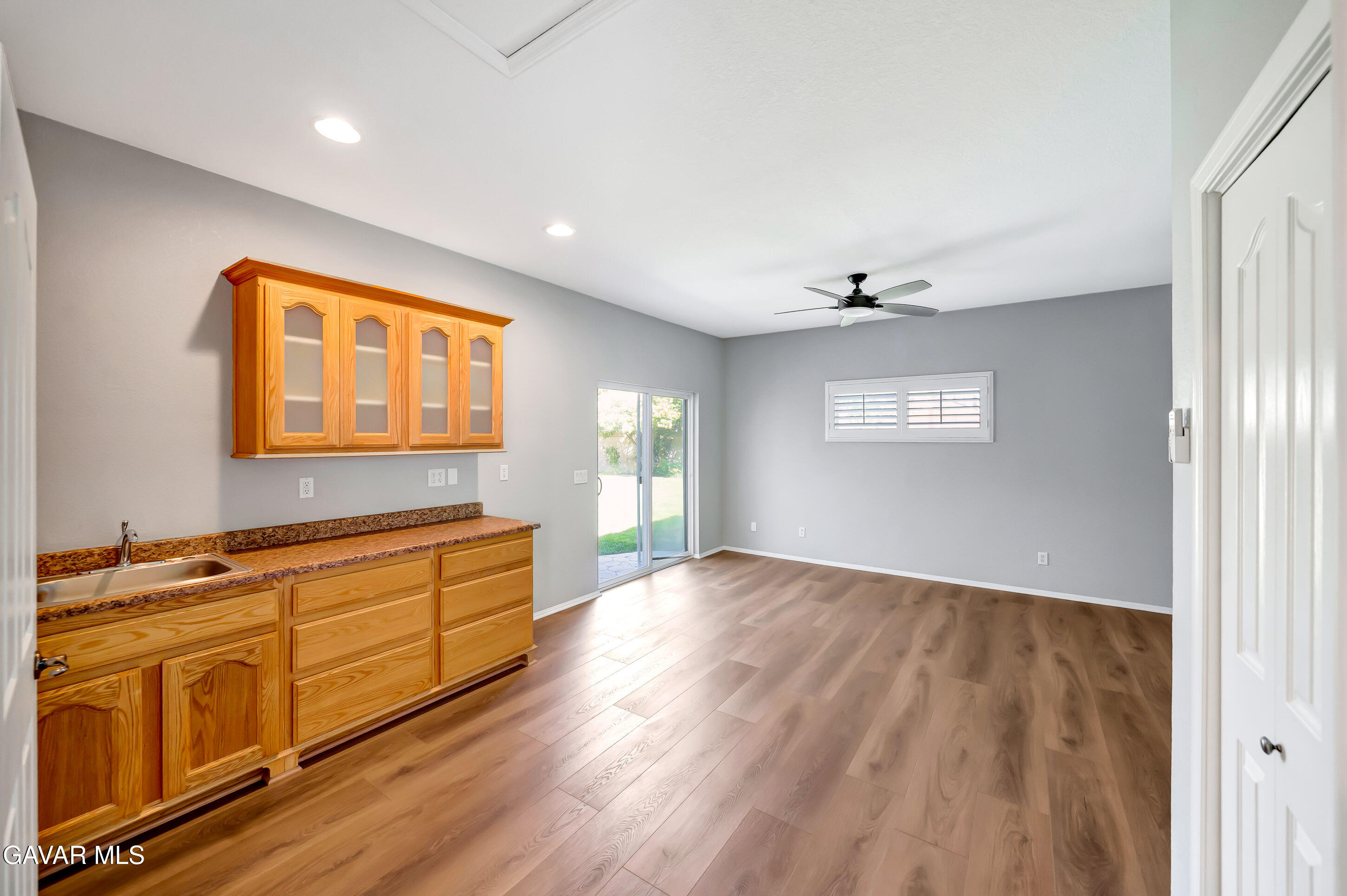 43826 Generation Avenue Lancaster, CA 93536 - Photo 29 of 61 a view of an empty room with window and wooden floor