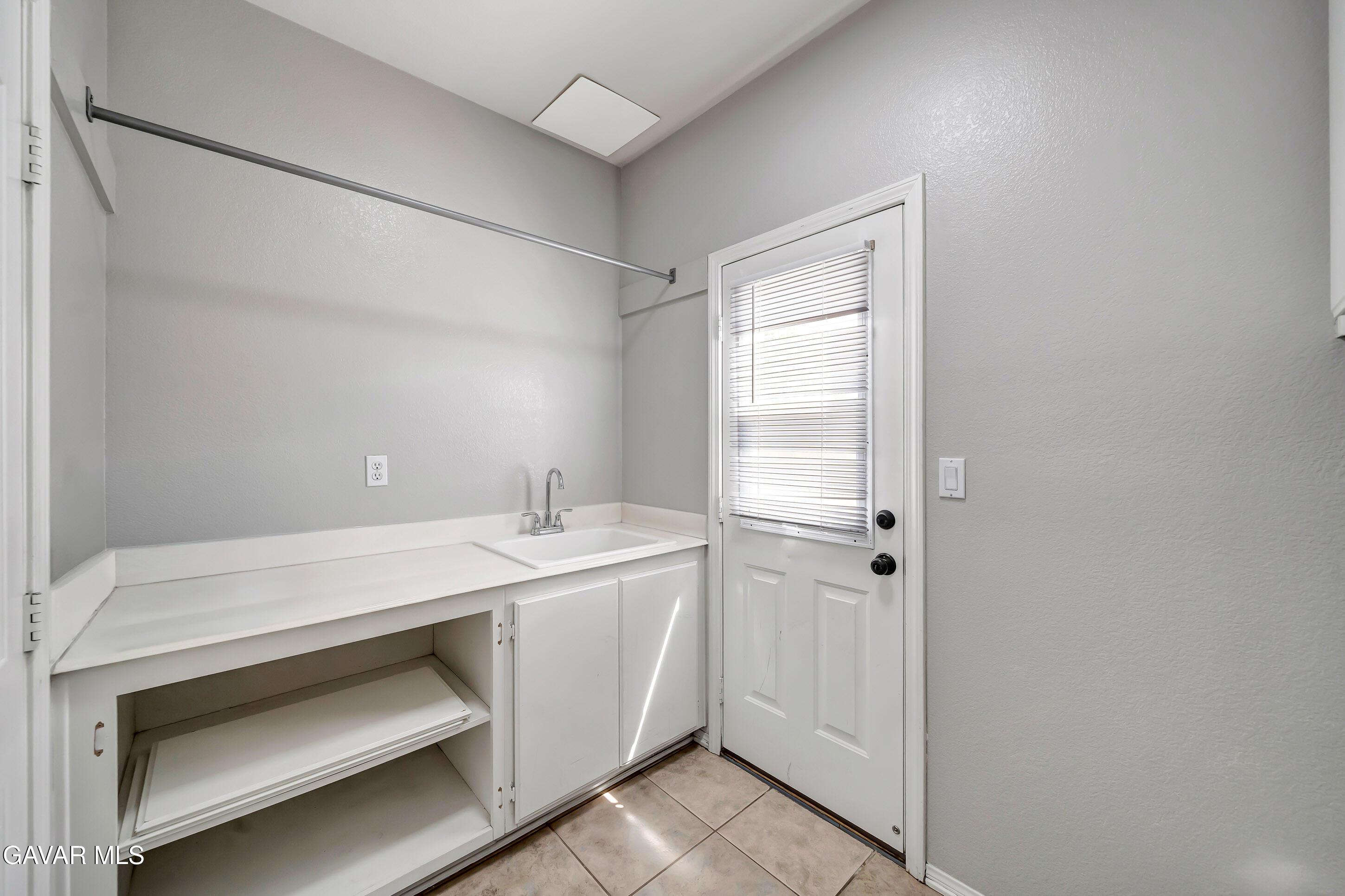 43826 Generation Avenue Lancaster, CA 93536 - Photo 34 of 61 a utility room with dryer and washer