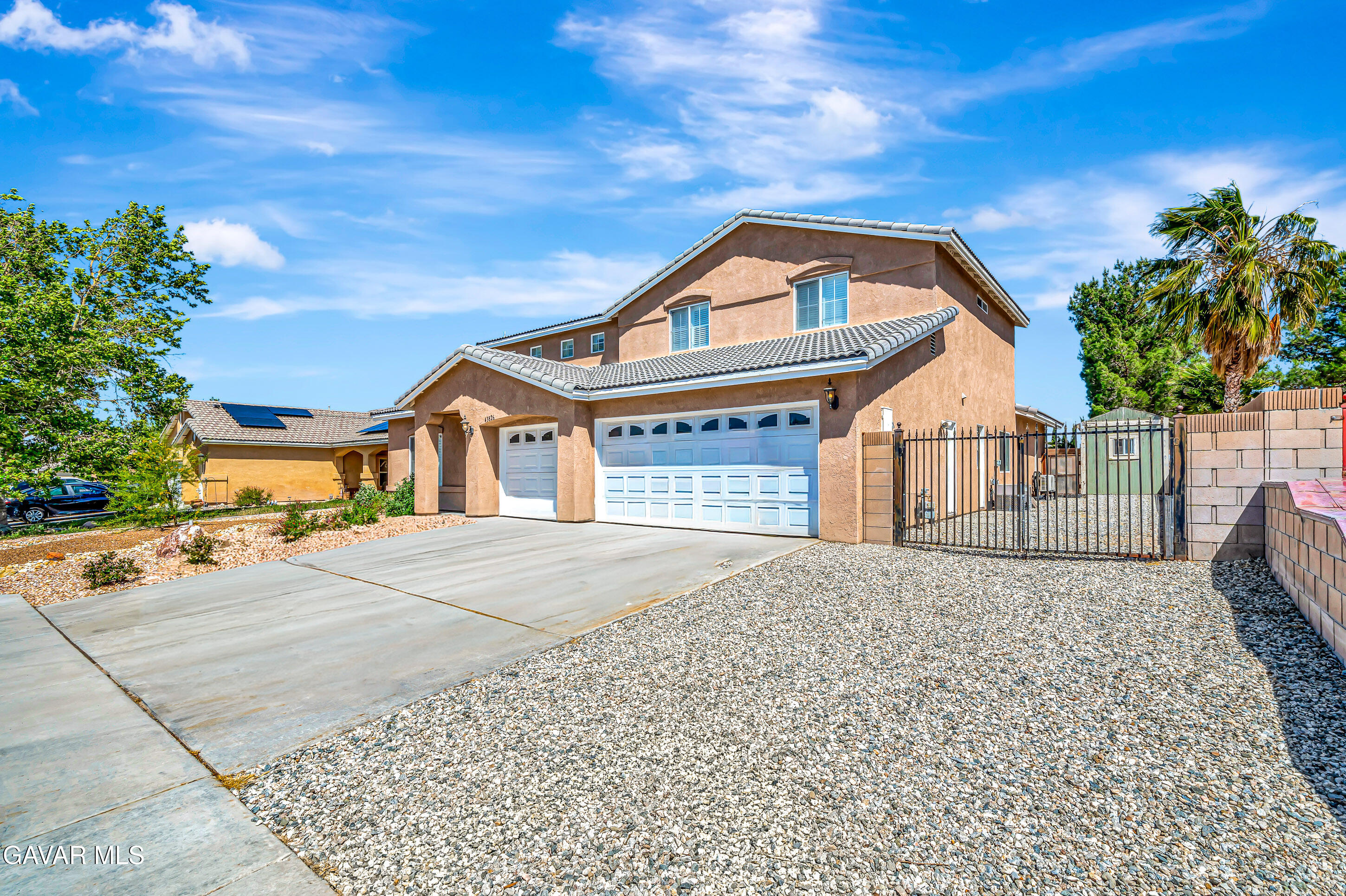 43826 Generation Avenue Lancaster, CA 93536 - Photo 60 of 61 a front view of a house with a yard