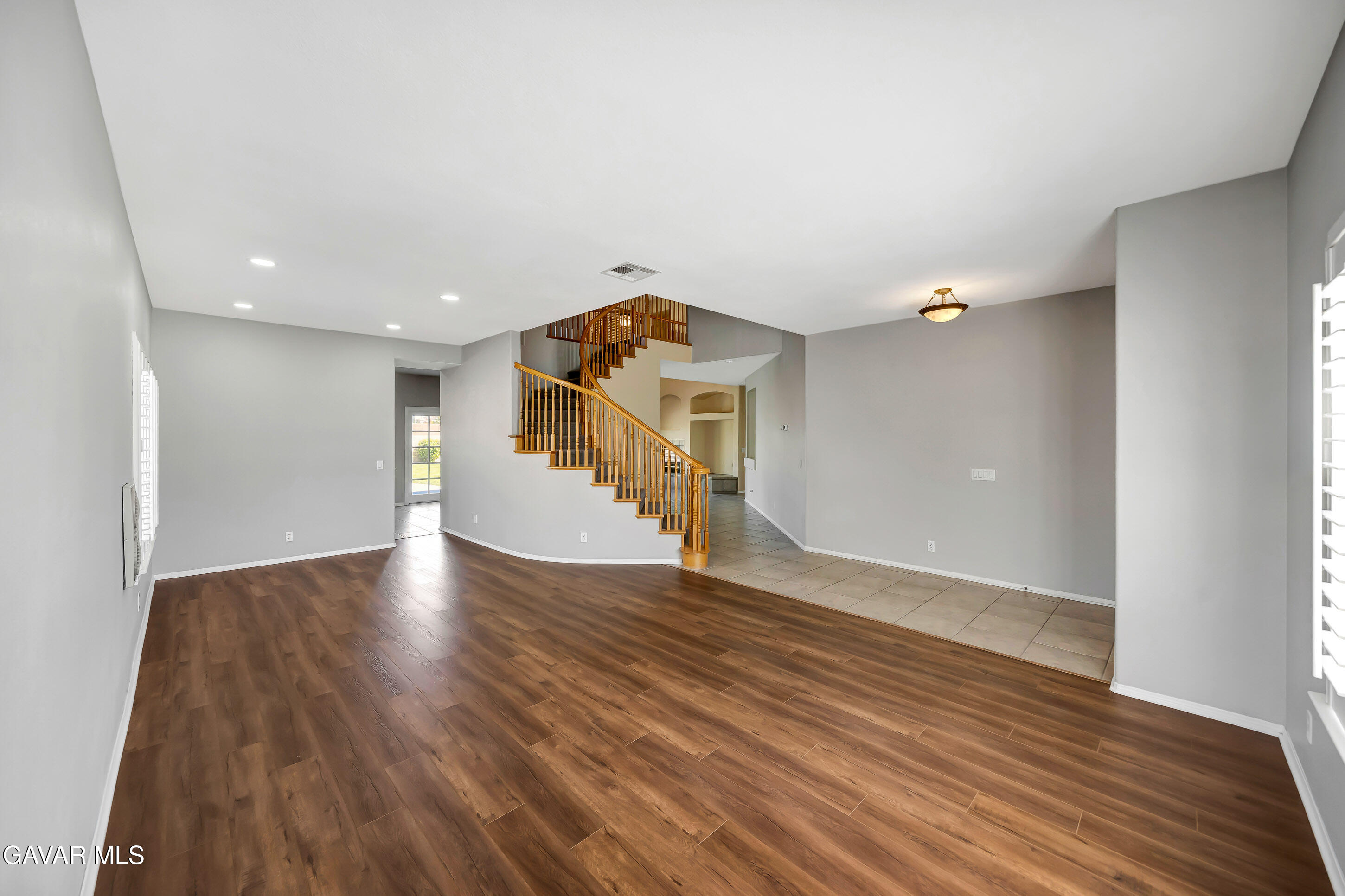 43826 Generation Avenue Lancaster, CA 93536 - Photo 10 of 61 a view of a livingroom with wooden floor
