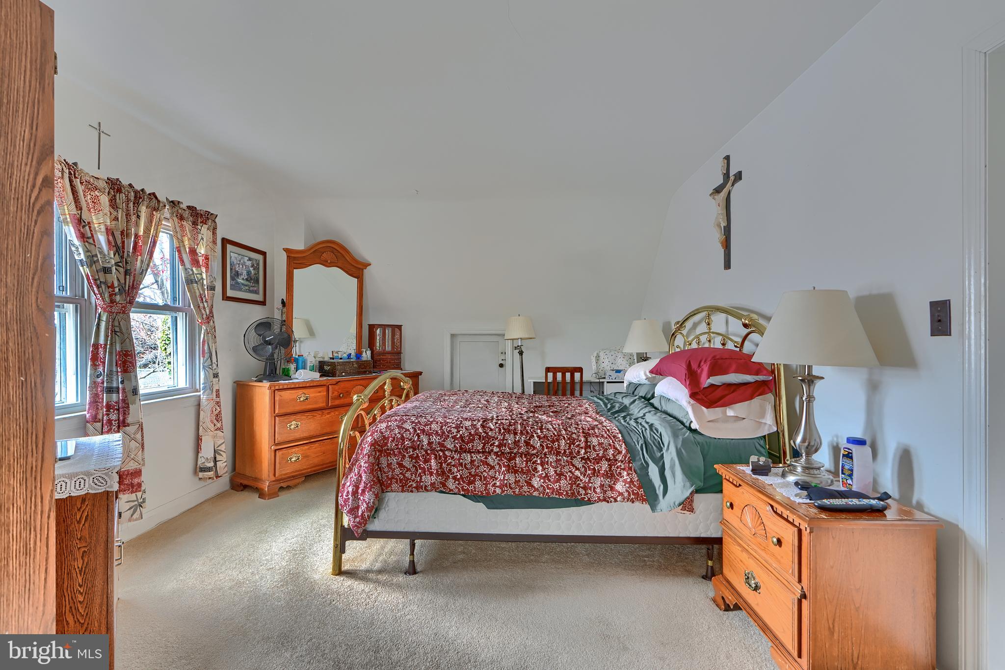 297 Hazel Avenue Baltimore, MD 21227 - Photo 24 of 56 a bedroom with bed and window