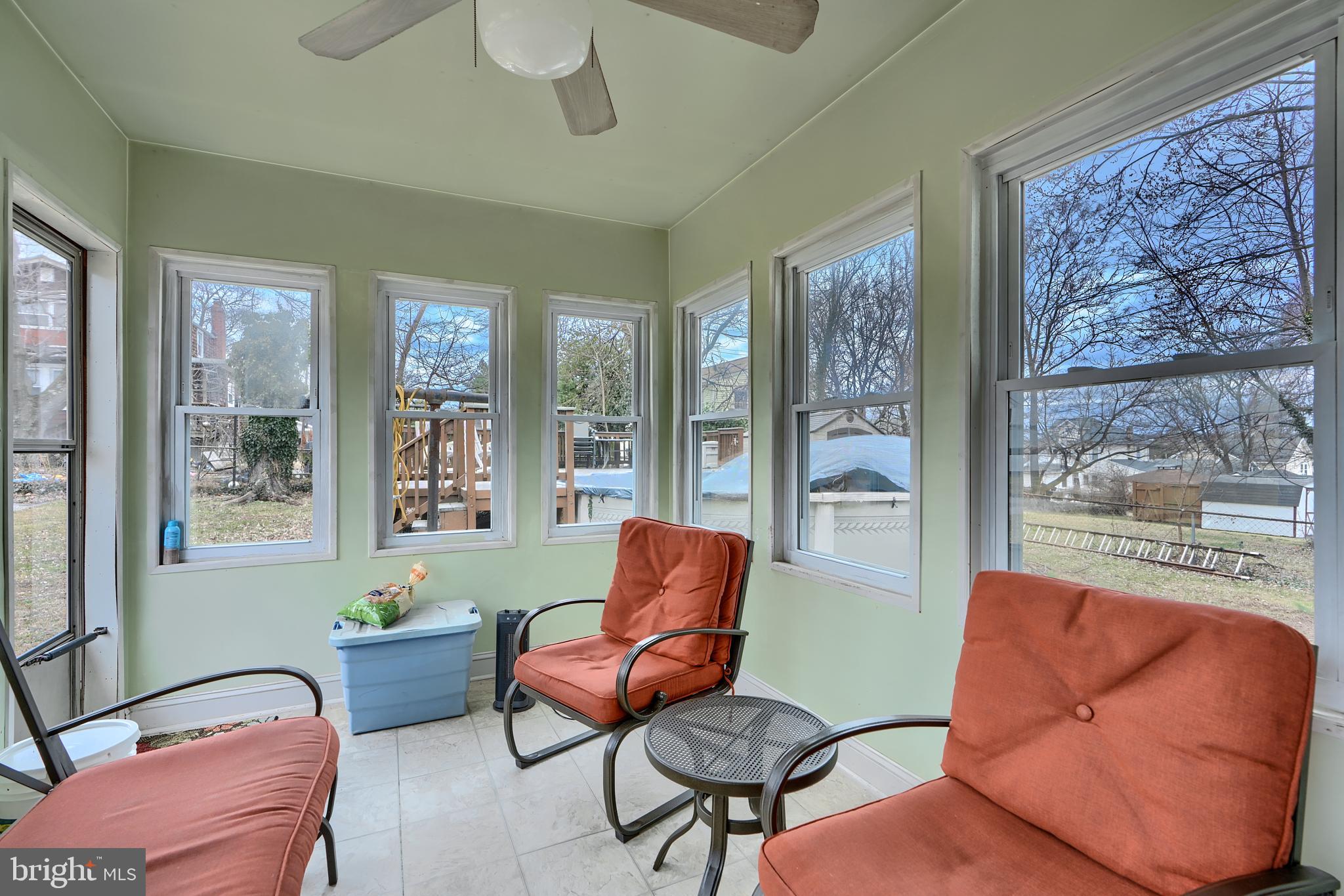 297 Hazel Avenue Baltimore, MD 21227 - Photo 38 of 56 a living room with furniture and a window
