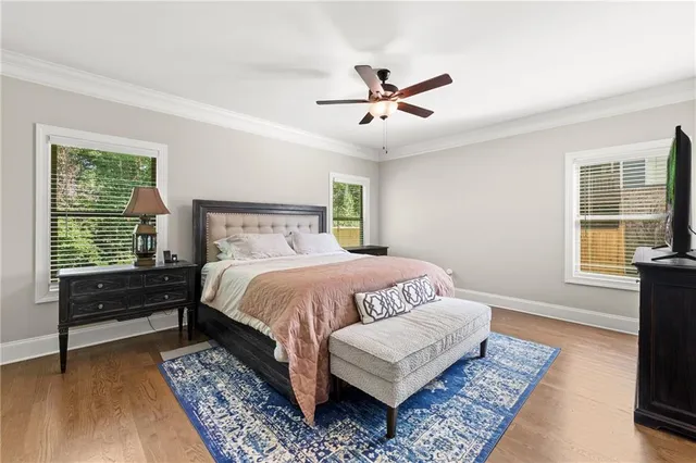 a bedroom with a bed and a large dresser