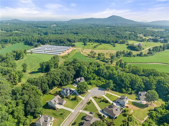 a view of a pool with a patio