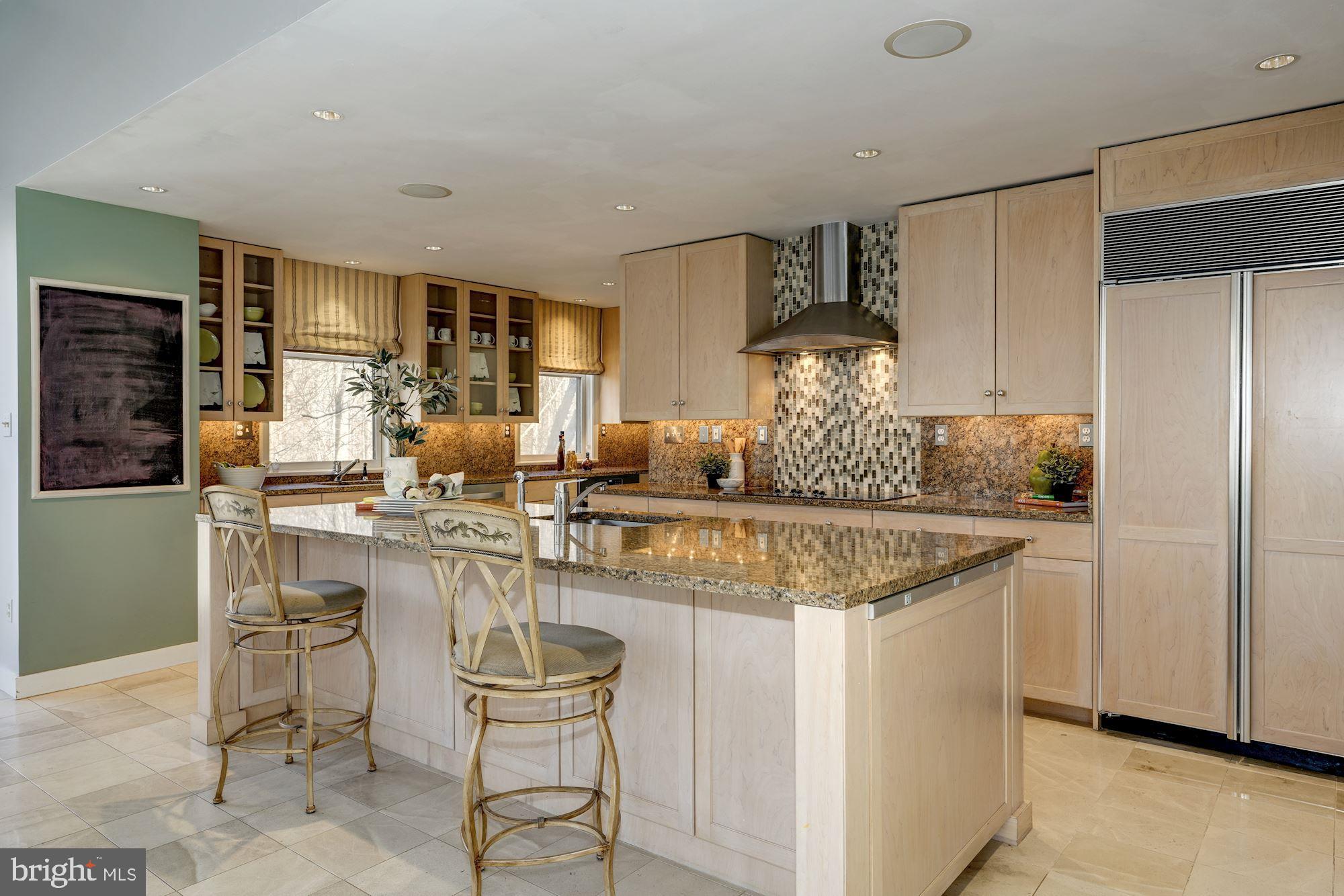 2008 Roundhouse Road Vienna, VA 22181 - Photo 26 of 71 Kitchen features center island & breakfast bar