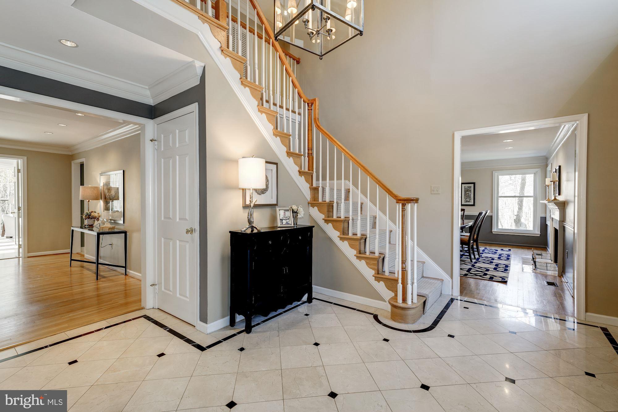 2008 Roundhouse Road Vienna, VA 22181 - Photo 7 of 71 Additional view of foyer with dining room beyond