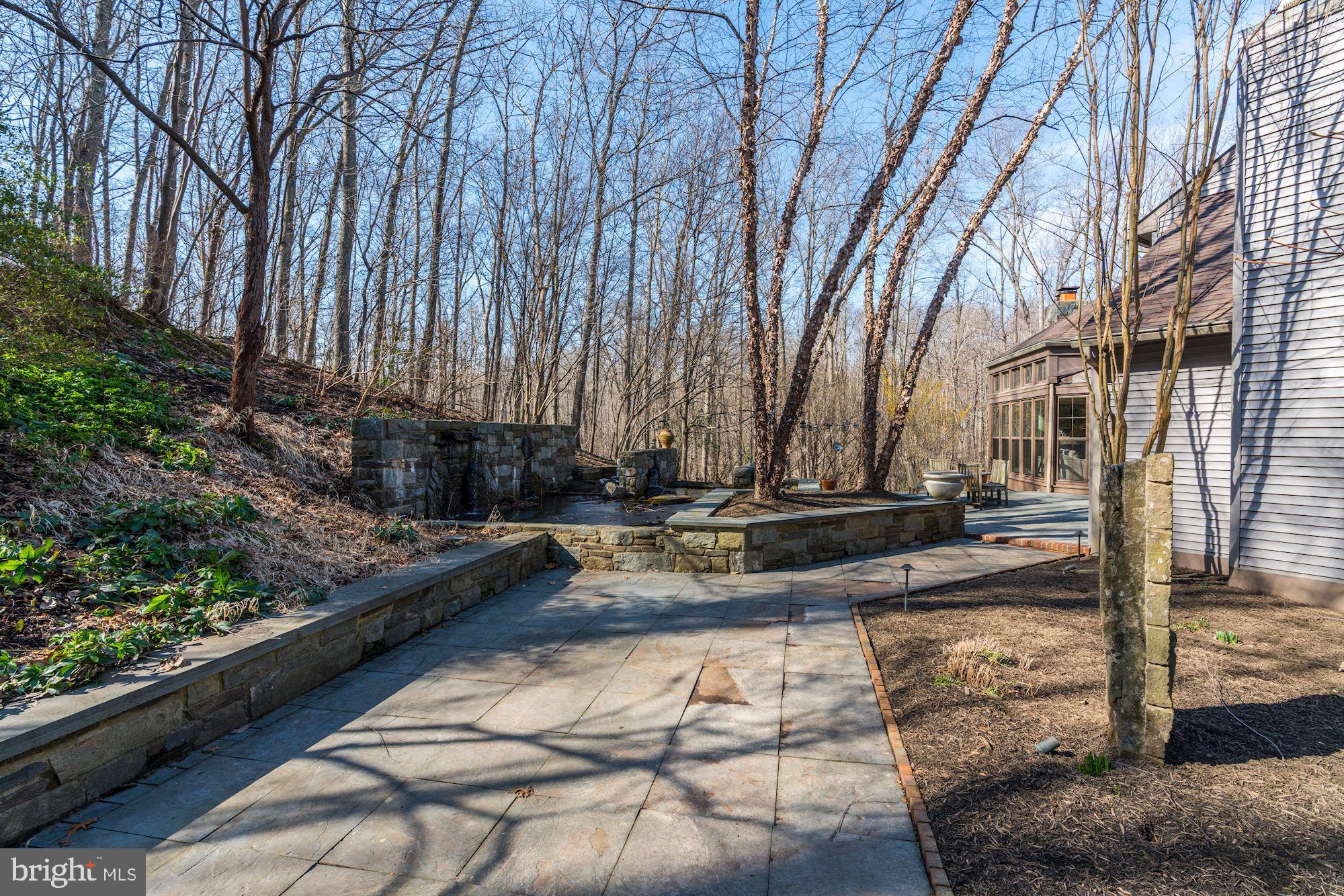 2008 Roundhouse Road Vienna, VA 22181 - Photo 61 of 71 Custom terrace wraps around the back of the home