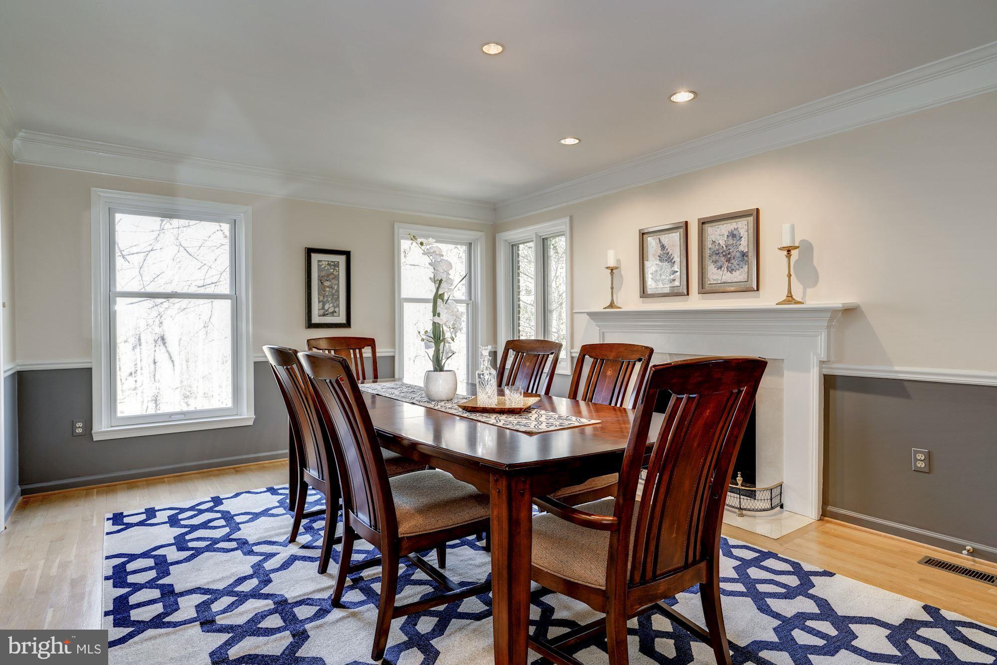 2008 Roundhouse Road Vienna, VA 22181 - Photo 9 of 71 Wood burning fireplace graces the formal dining rm