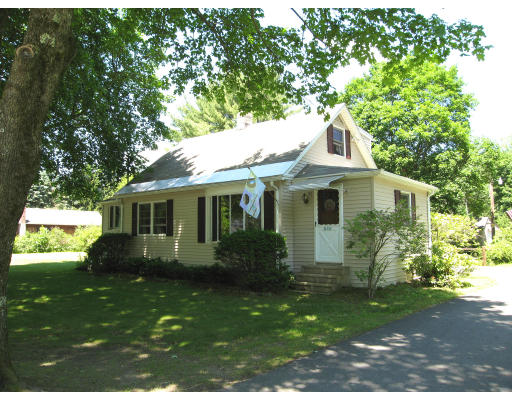 839 Westhampton Road Northampton, MA 01062 - Photo 1 of 8 a front view of house with yard and green space