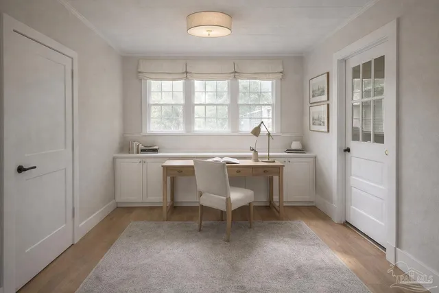 a dining room with a sink and a window