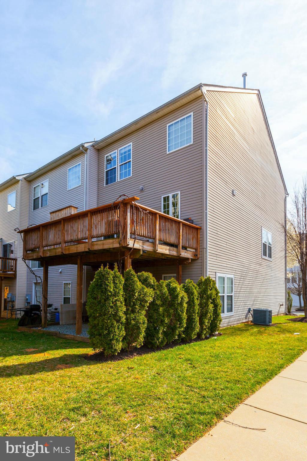 14031 Rockingham Road Germantown, MD 20874 - Photo 2 of 22 Rear view with deck