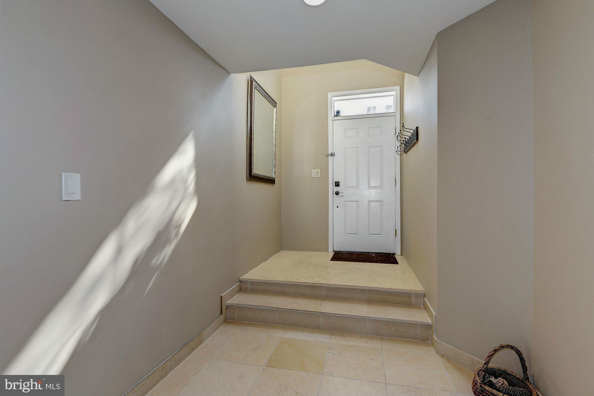 14031 Rockingham Road Germantown, MD 20874 - Photo 4 of 22 stone floor entry
