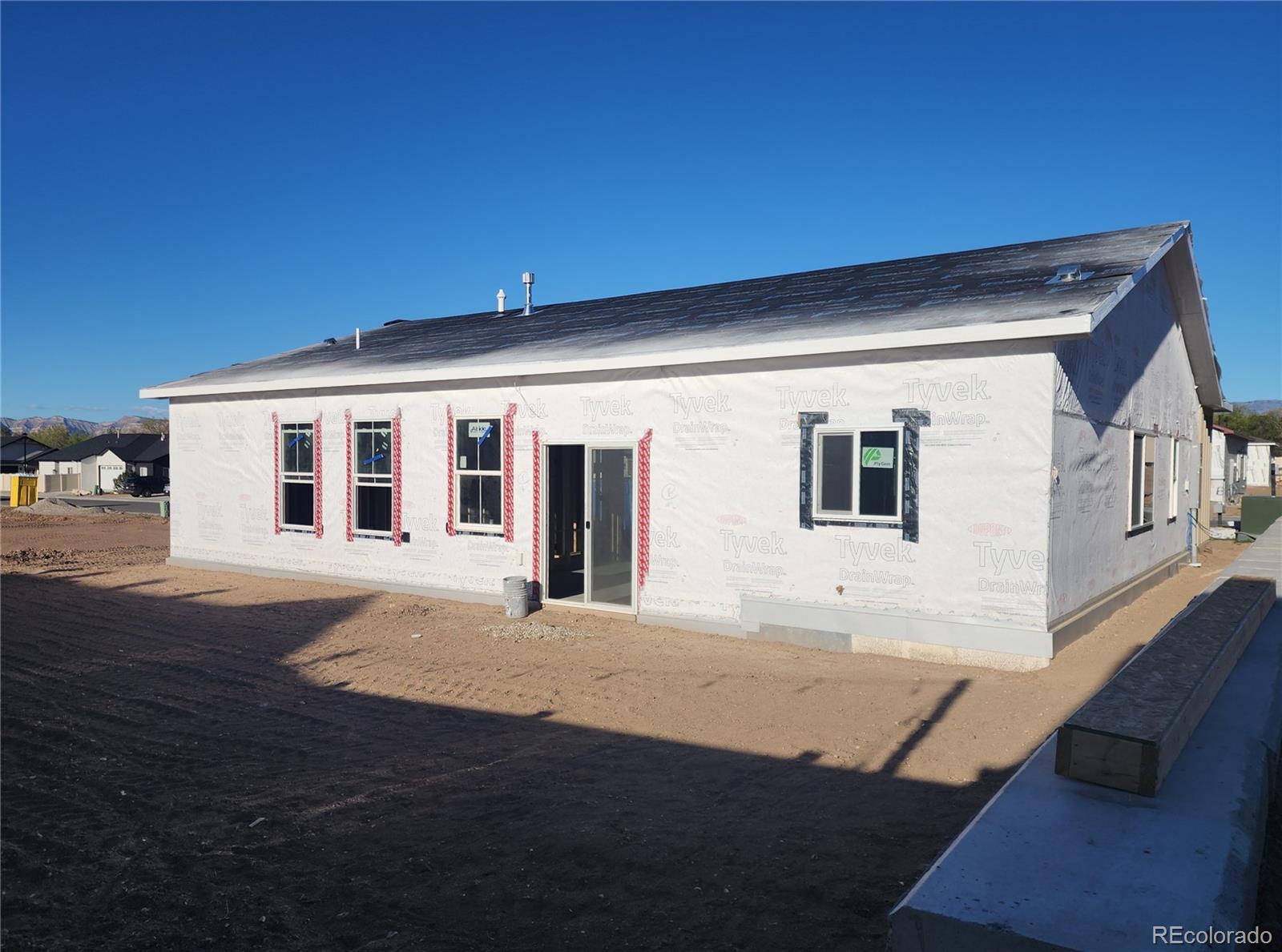 255 Sasha Street Grand Junction, CO 81503 - Photo 4 of 8 a front view of a house with yard