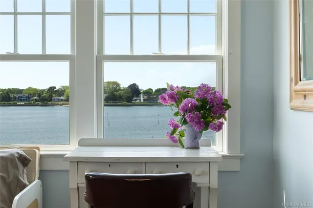 a view of hall with furniture