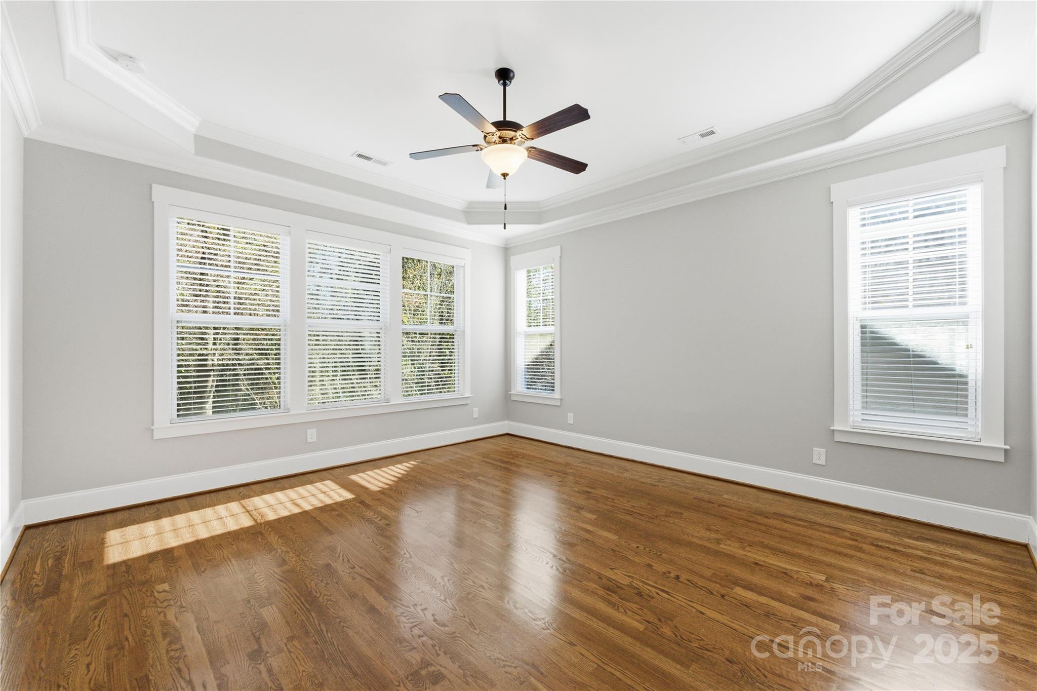 743 Bluff Loop Road Rock Hill, SC 29730 - Photo 13 of 37 a view of an empty room with wooden floor and a window