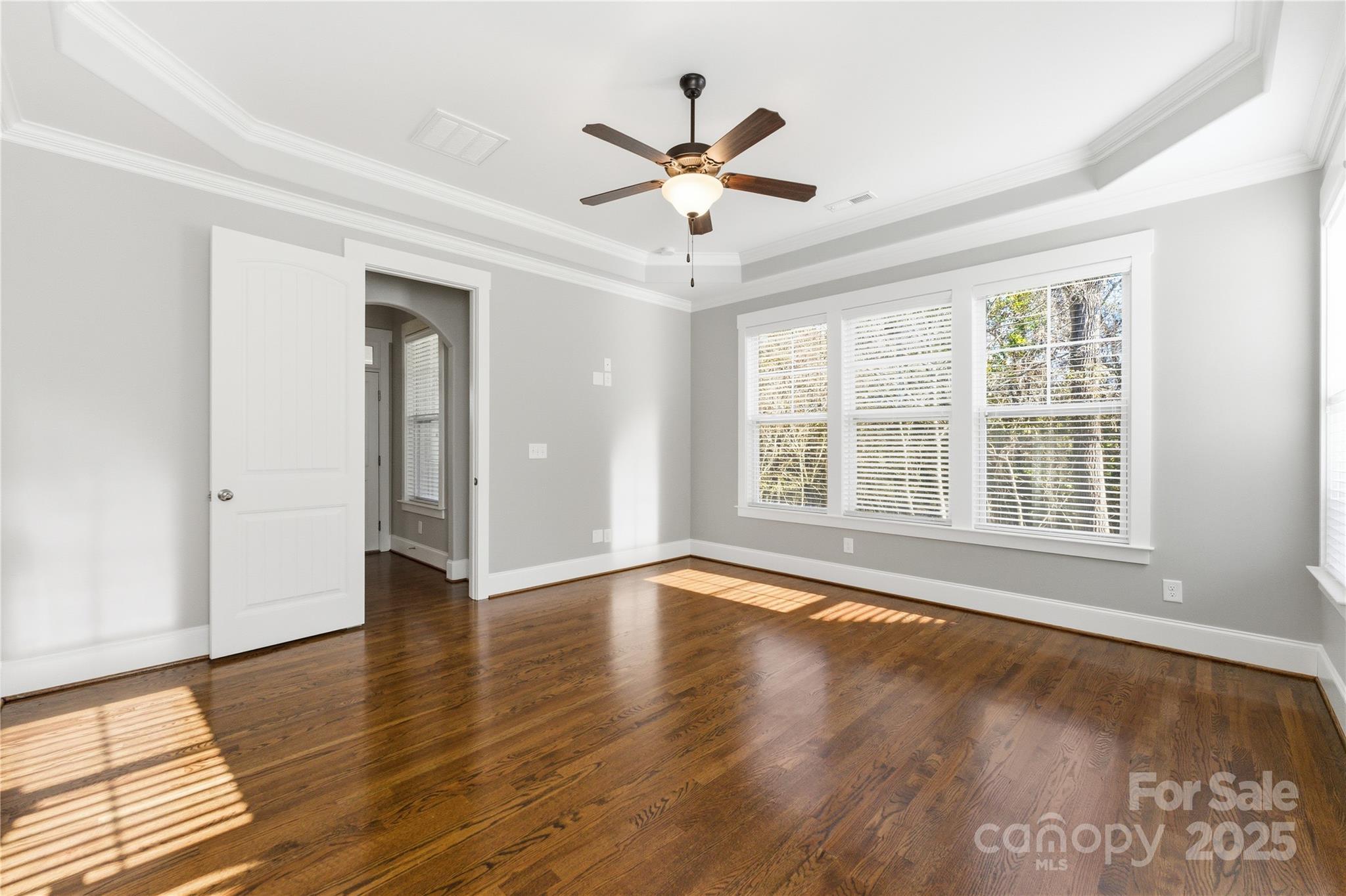 743 Bluff Loop Road Rock Hill, SC 29730 - Photo 14 of 37 a view of an empty room with wooden floor and a window