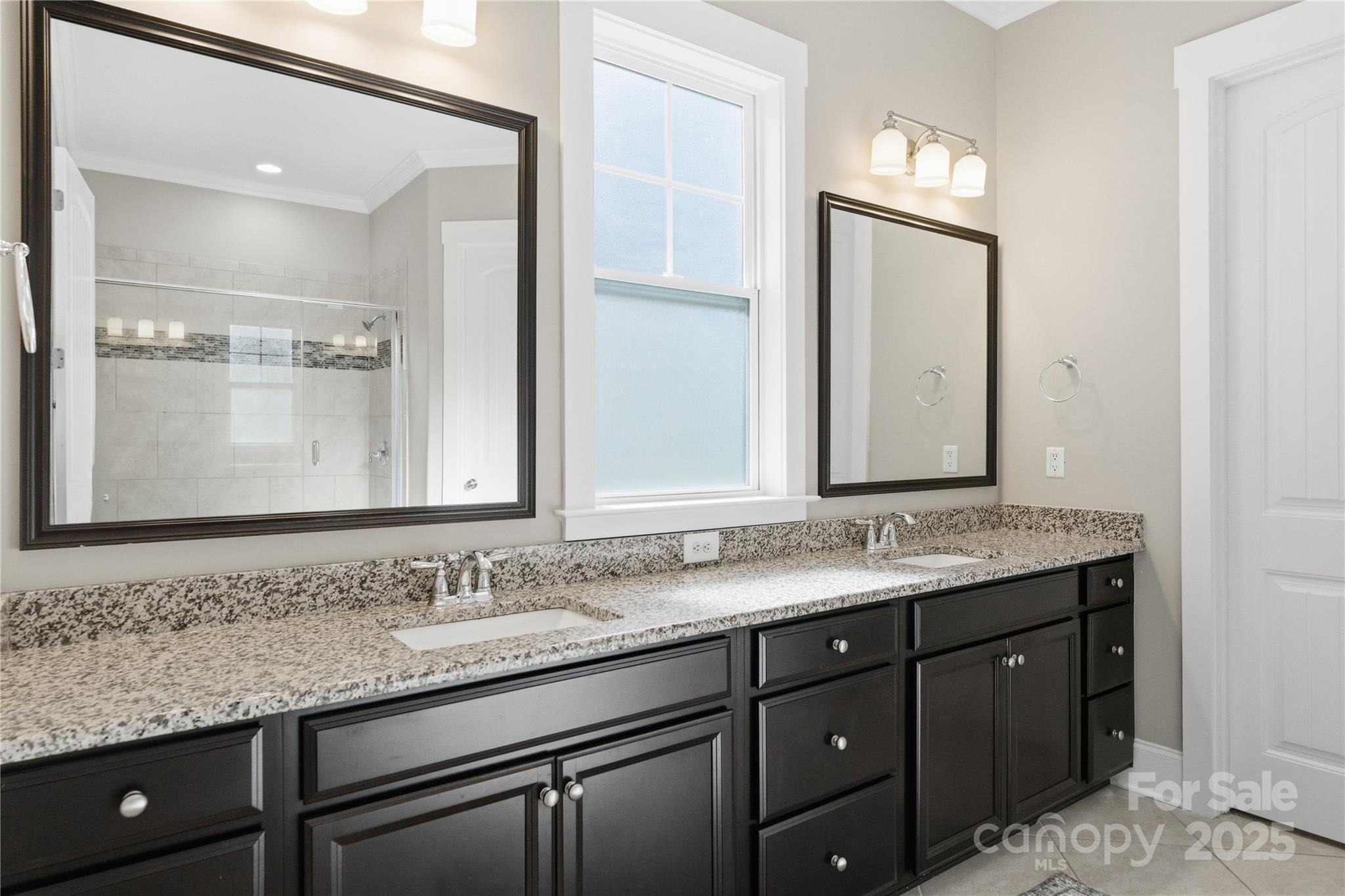 743 Bluff Loop Road Rock Hill, SC 29730 - Photo 16 of 37 a bathroom with a granite countertop sink and a mirror