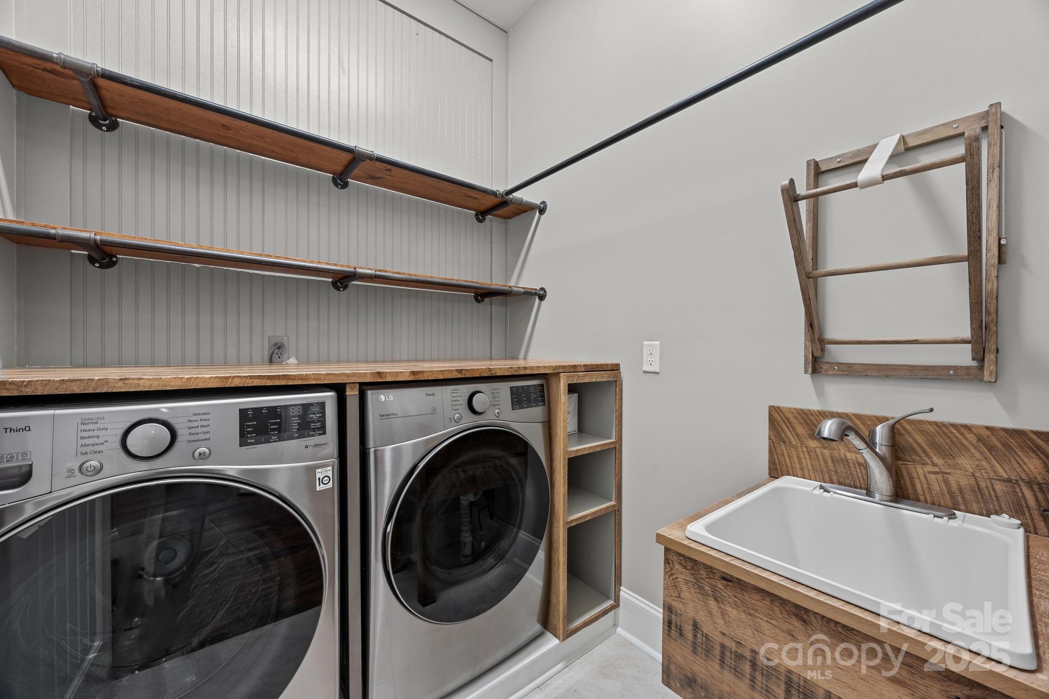 743 Bluff Loop Road Rock Hill, SC 29730 - Photo 20 of 37 a utility room with dryer and washer