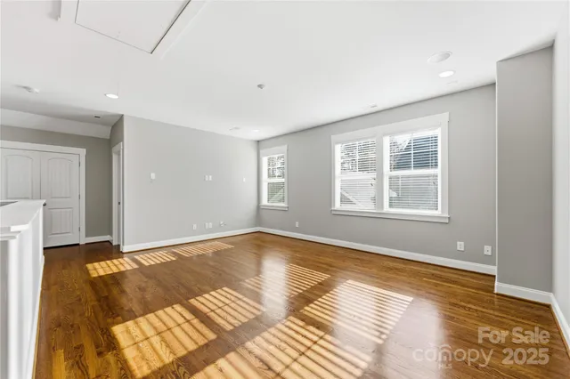 a view of a balcony with wooden floor