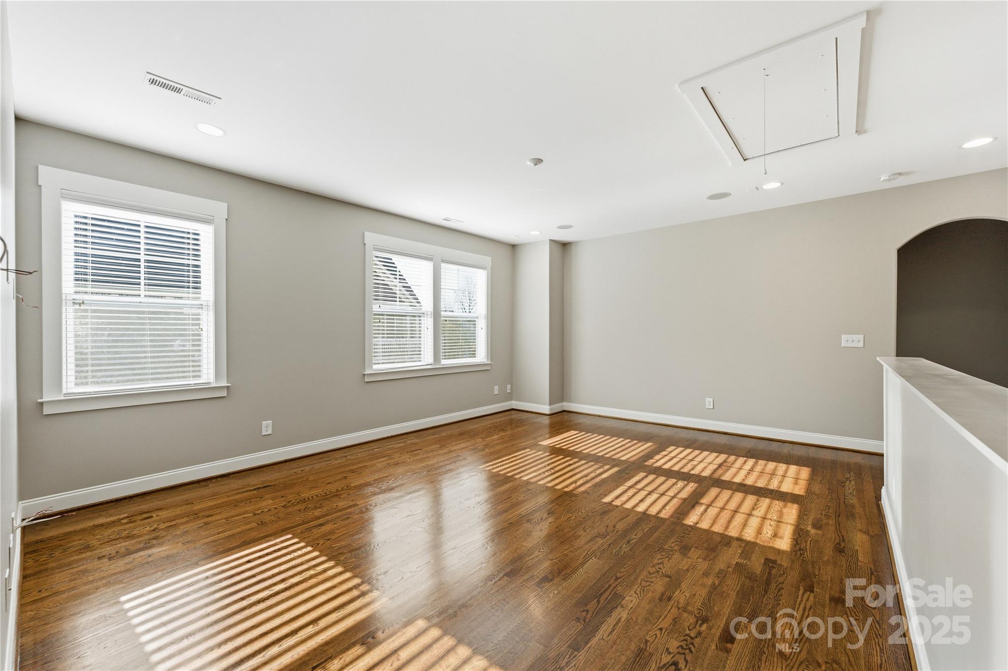 743 Bluff Loop Road Rock Hill, SC 29730 - Photo 23 of 37 a view of an empty room with wooden floor and a window