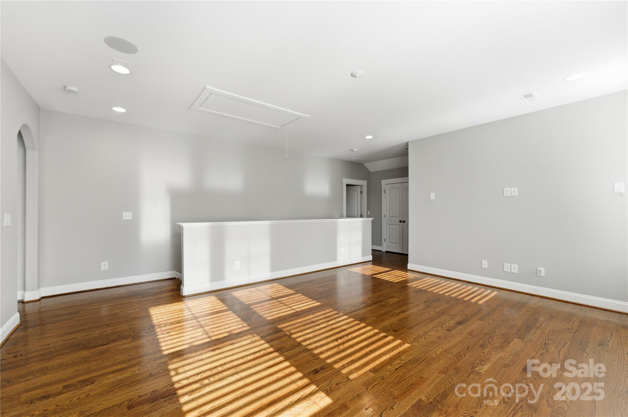 743 Bluff Loop Road Rock Hill, SC 29730 - Photo 24 of 37 a view of an empty room with wooden floor