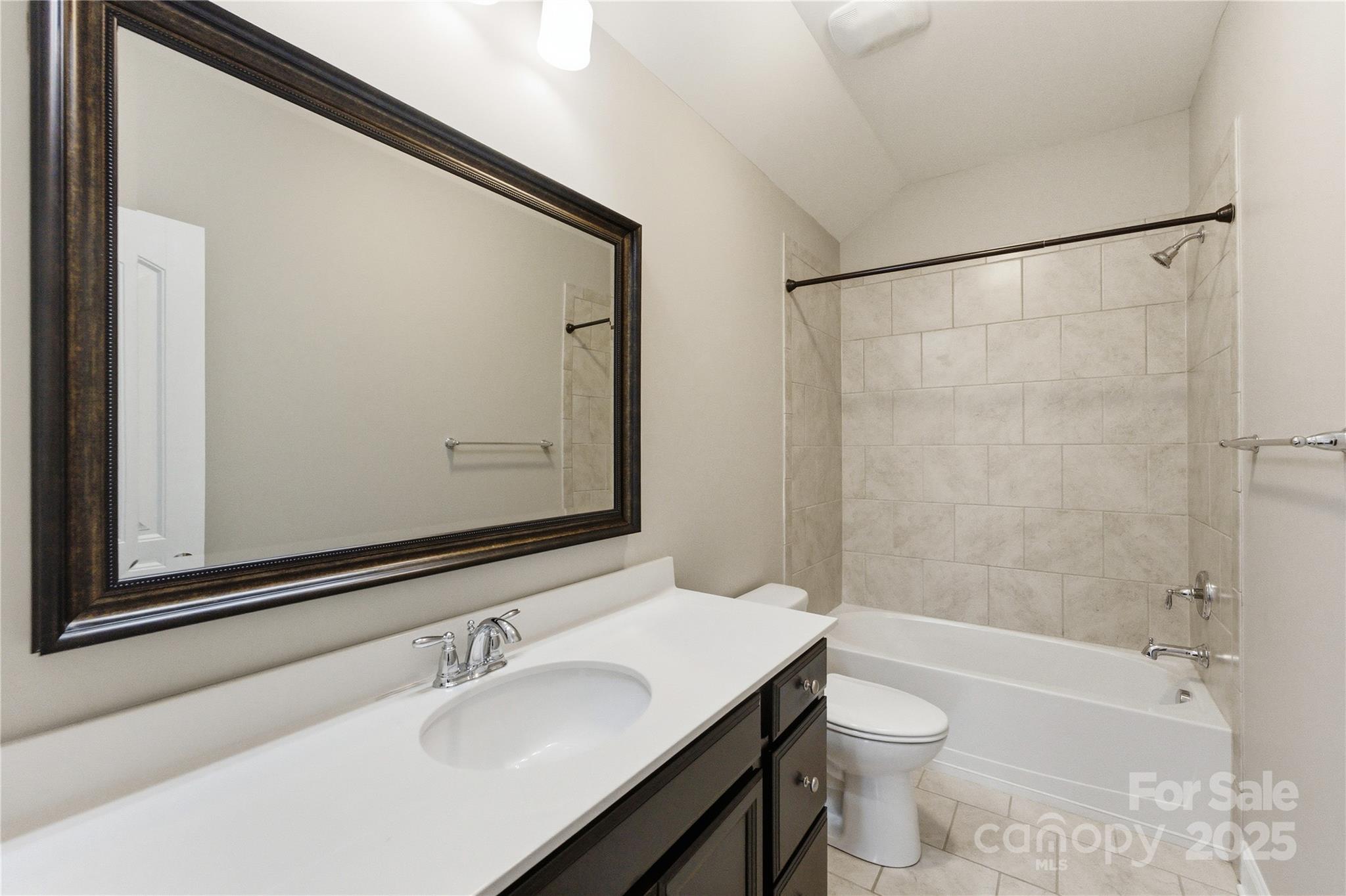 743 Bluff Loop Road Rock Hill, SC 29730 - Photo 29 of 37 a bathroom with a sink and a mirror