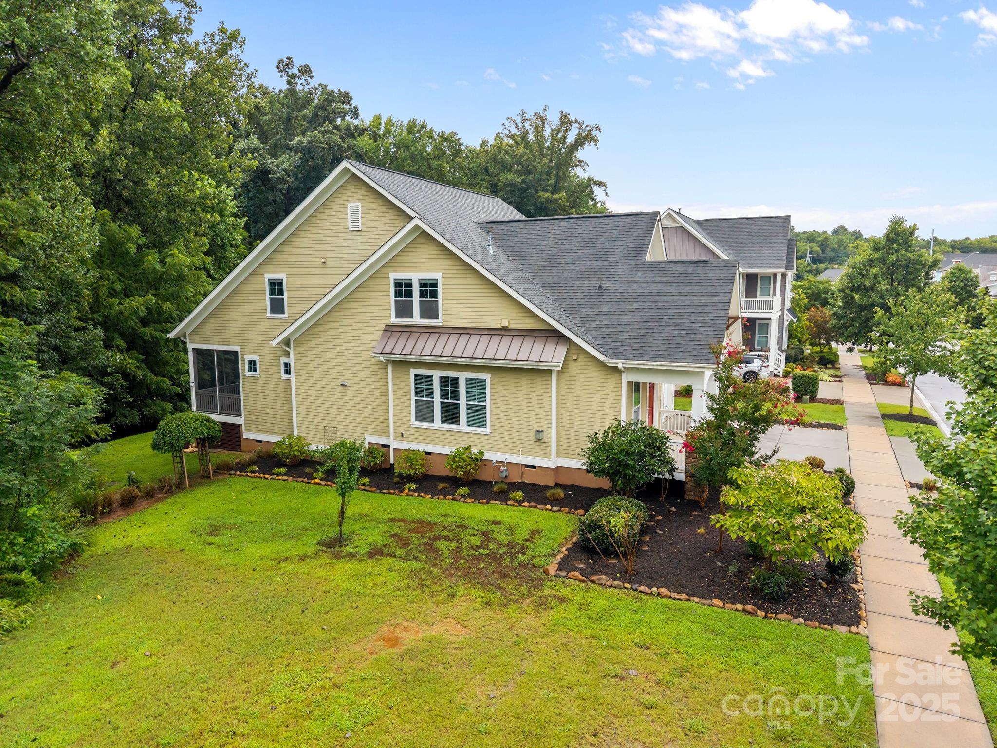 743 Bluff Loop Road Rock Hill, SC 29730 - Photo 35 of 37 a view of a house with a yard patio and a small yard
