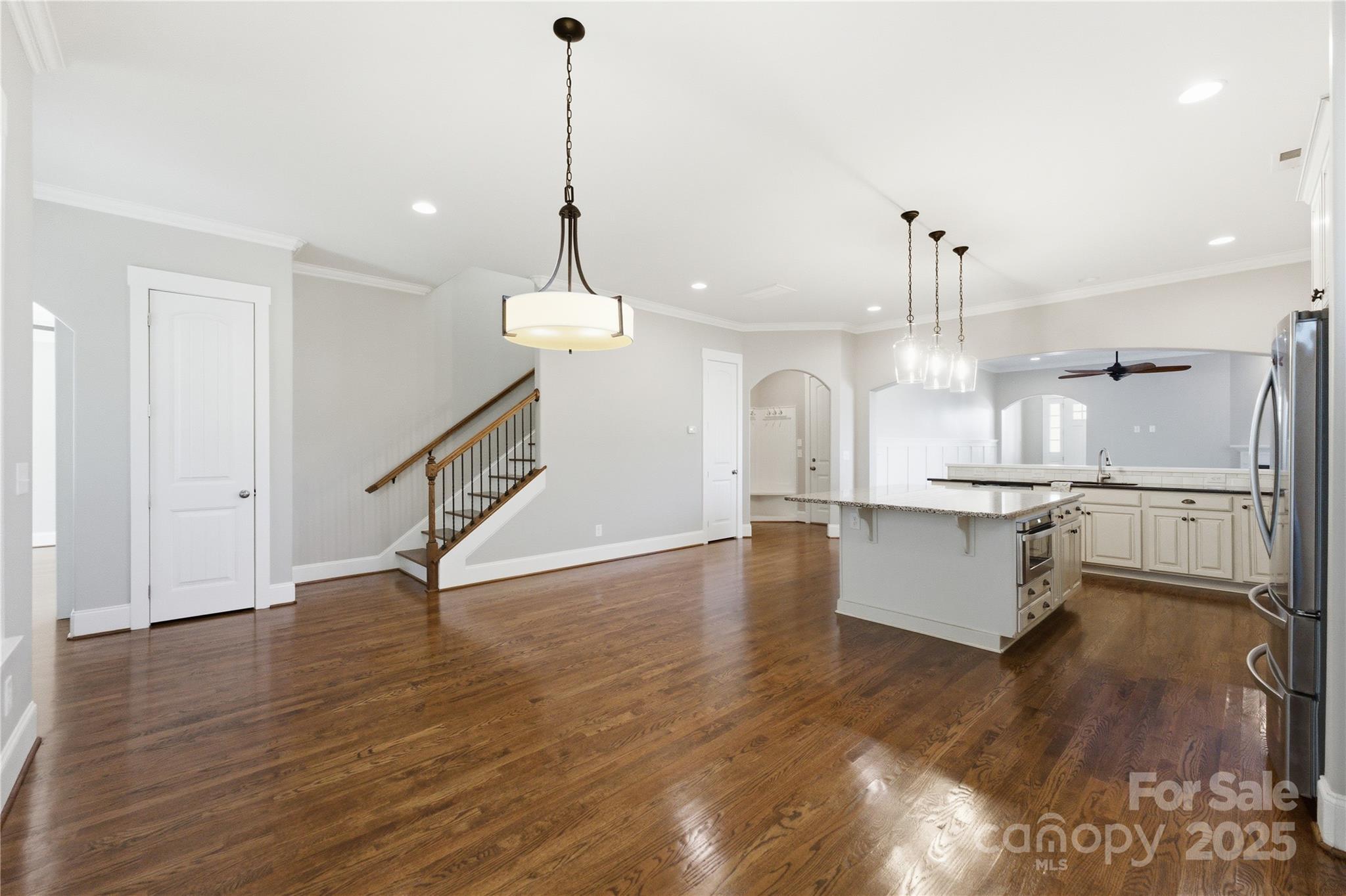 743 Bluff Loop Road Rock Hill, SC 29730 - Photo 4 of 37 a view of a kitchen with a sink a window and wooden floor