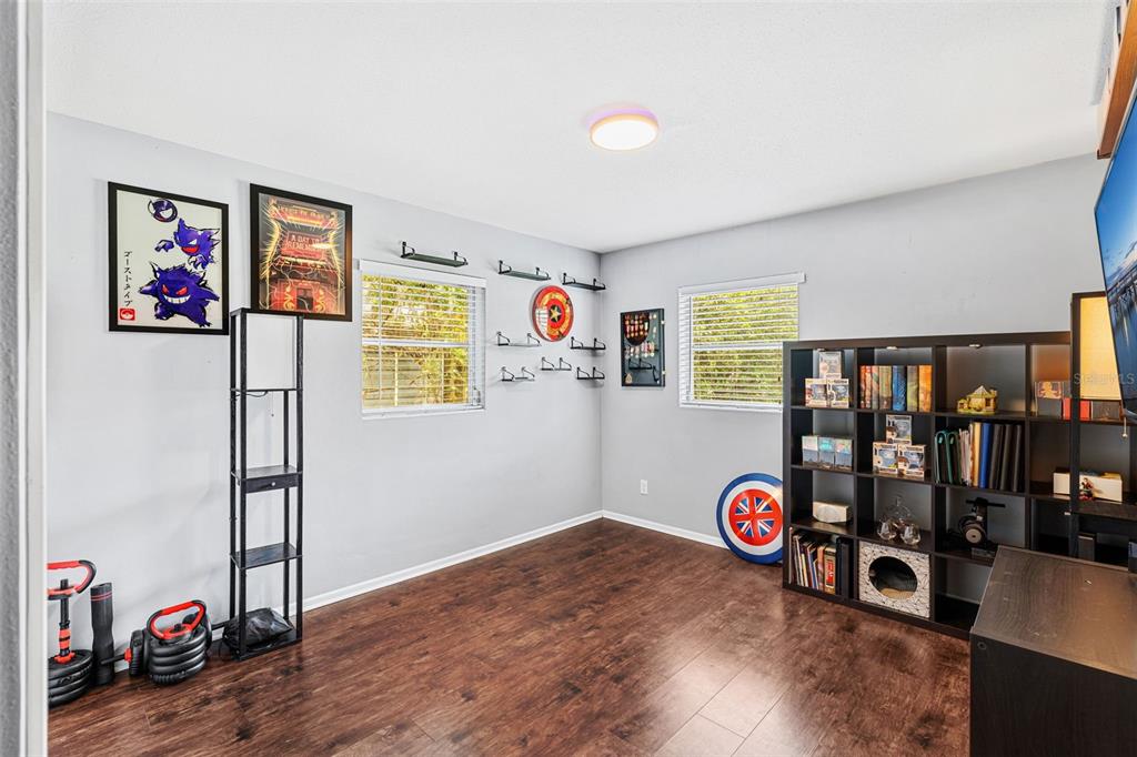 2923 Conway Gardens Road Orlando, FL 32806 - Photo 17 of 28 a view of a room with gym equipment