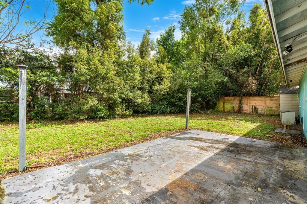 2923 Conway Gardens Road Orlando, FL 32806 - Photo 26 of 28 a view of a park with large trees