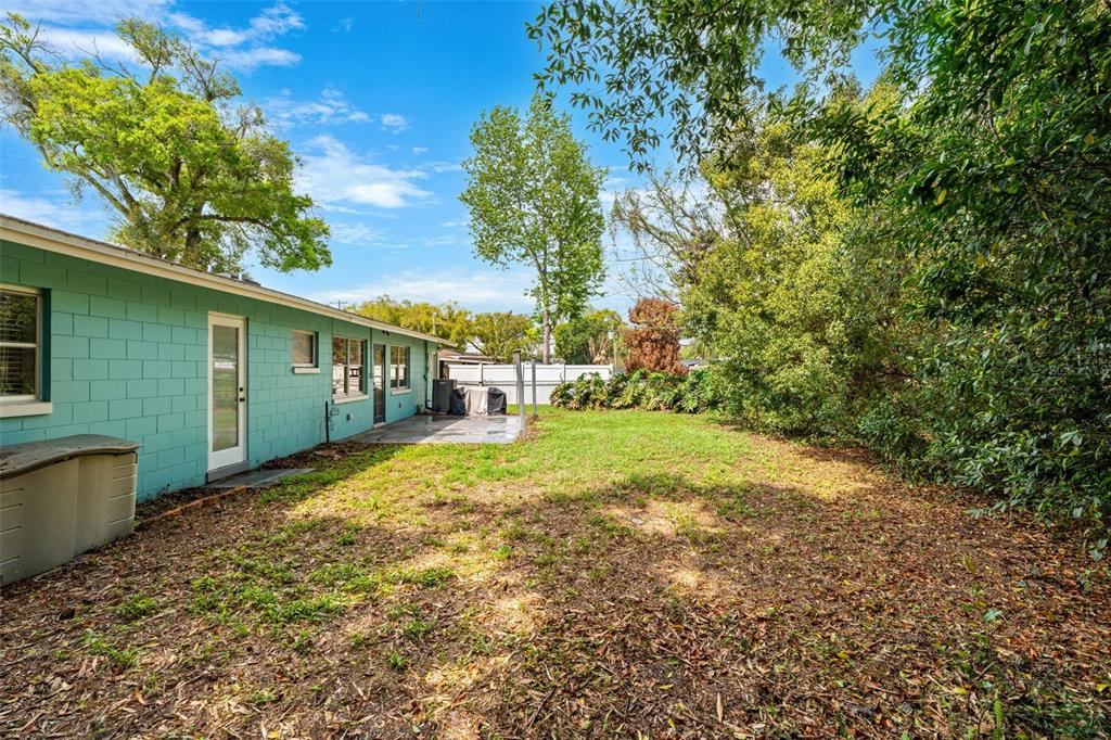 2923 Conway Gardens Road Orlando, FL 32806 - Photo 27 of 28 a view of backyard of the house
