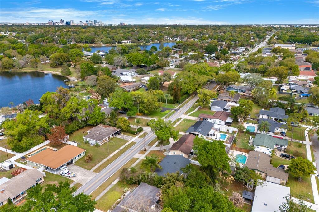 2923 Conway Gardens Road Orlando, FL 32806 - Photo 7 of 28 an aerial view of residential houses with outdoor space