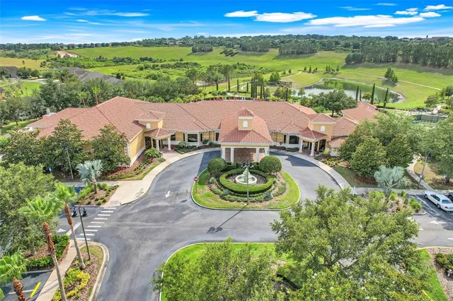 an aerial view of a house with garden space and outdoor space