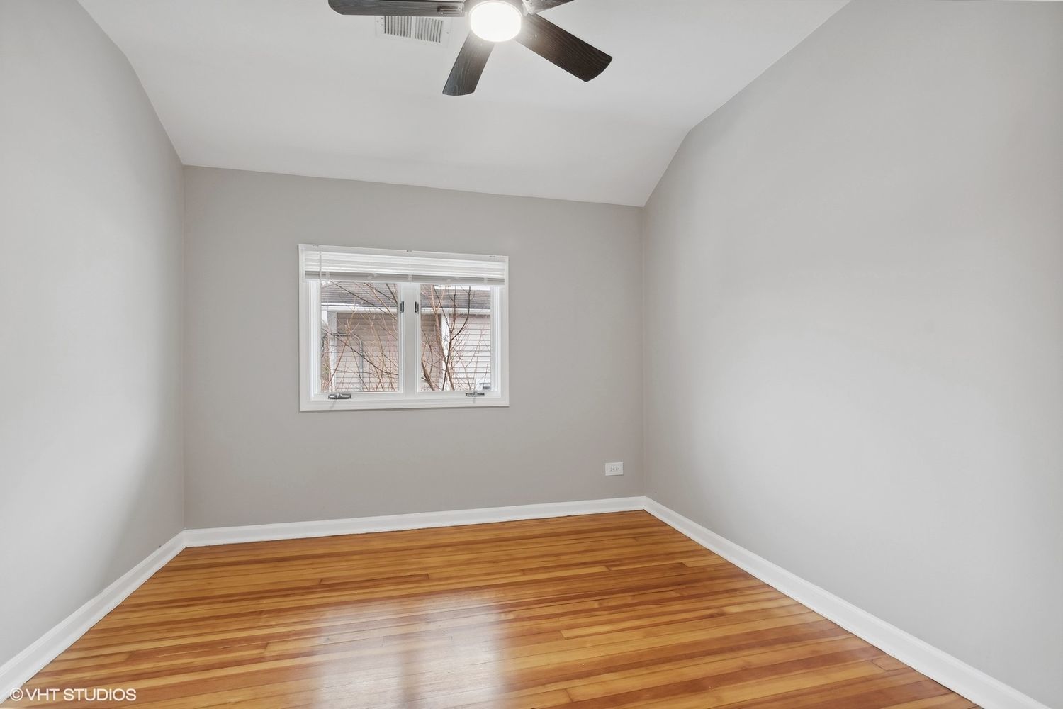 2490 Green Bay Road Highland Park, IL 60035 - Photo 23 of 29 a view of a room with wooden floor fan and windows