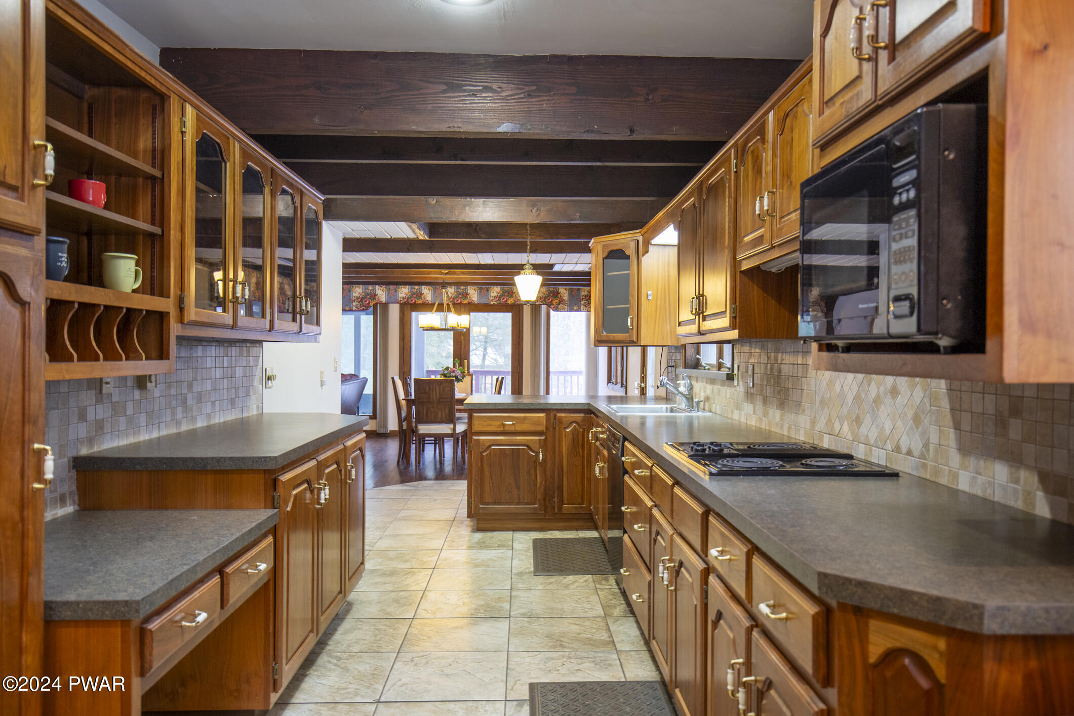 365 Northgate Road Lake Ariel, PA 18436 - Photo 8 of 68 a kitchen with stainless steel appliances granite countertop a sink and cabinets