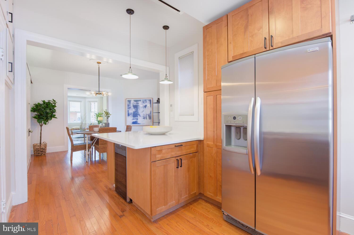 125 Randolph Place Northwest Washington, DC 20001 - Photo 12 of 51 Kitchen w Ample Cabinetry & Pendant Lighting