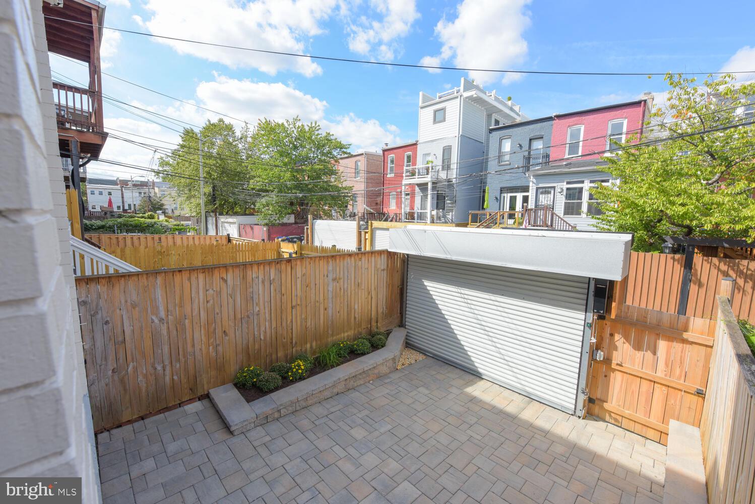 125 Randolph Place Northwest Washington, DC 20001 - Photo 30 of 51 Commercial Rolltop Garage Door & Planter Bed