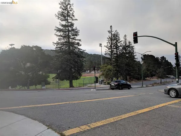 a view of street with cars