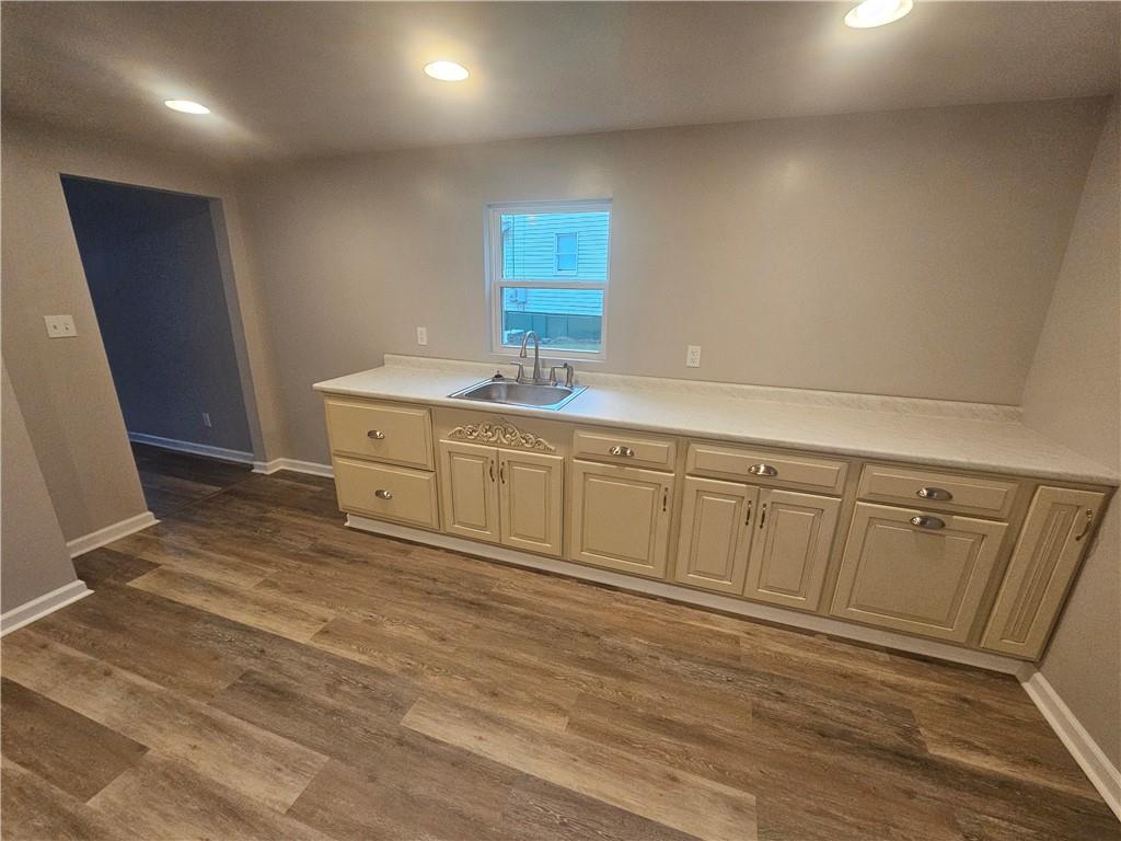17 Hemlock Street Ellsworth, PA 15314 - Photo 5 of 9 a view of a kitchen with white cabinets