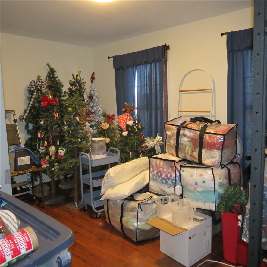 10160 Lochard Road Sidney, OH 45365 - Photo 26 of 41 This interior space features beautiful hardwood flooring.