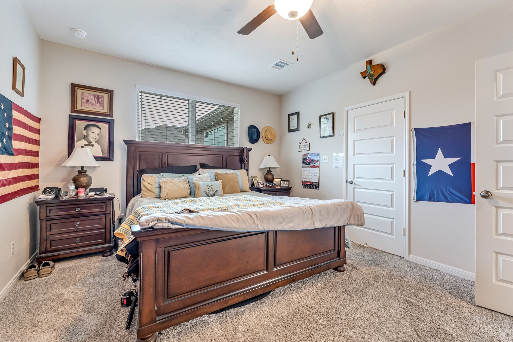 1946 Chief Street Bryan, TX 77807 - Photo 15 of 30 a bedroom with a bed and a painting on the wall