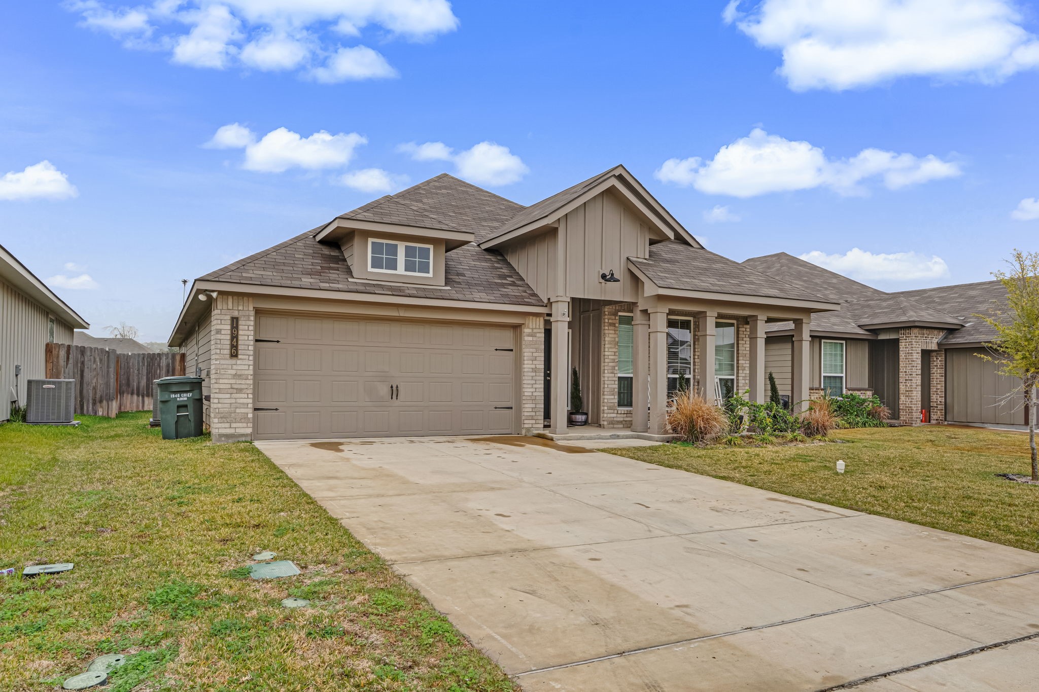 1946 Chief Street Bryan, TX 77807 - Photo 26 of 30 a front view of a house with a garden and yard