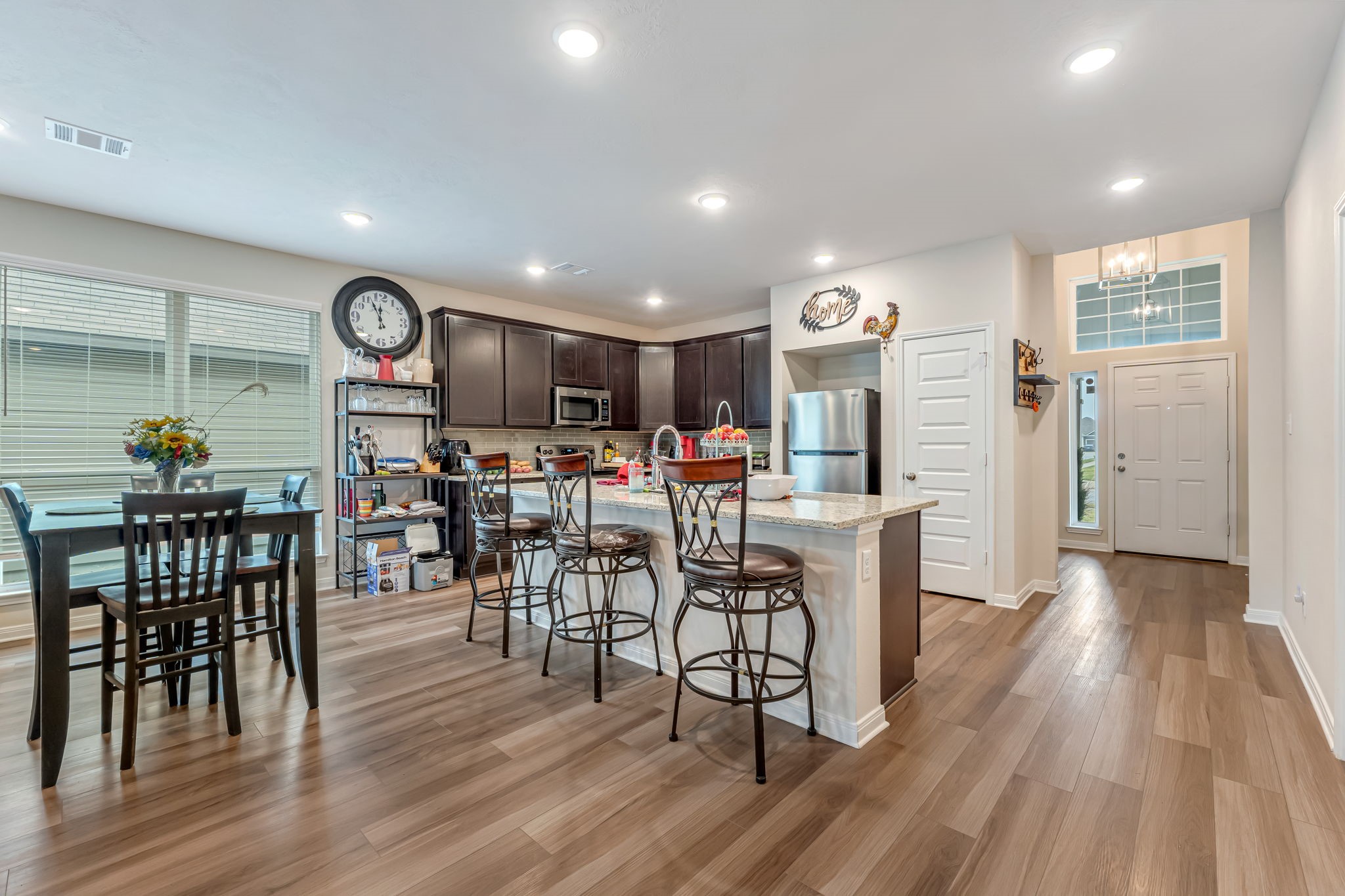 1946 Chief Street Bryan, TX 77807 - Photo 3 of 30 a view of a dining area with furniture and wooden floor