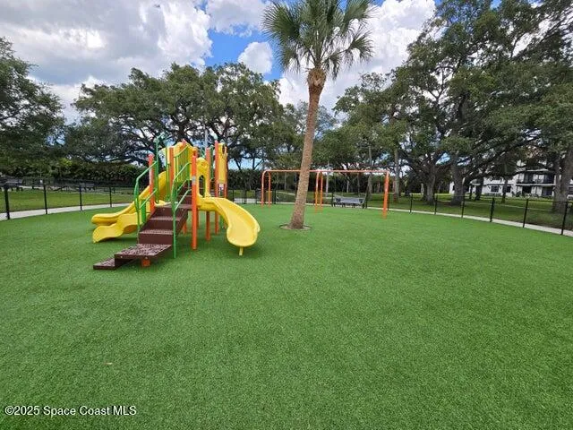 a view of a park with slide