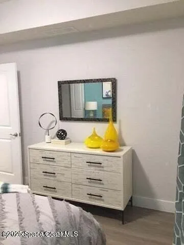 a view of room with mirror