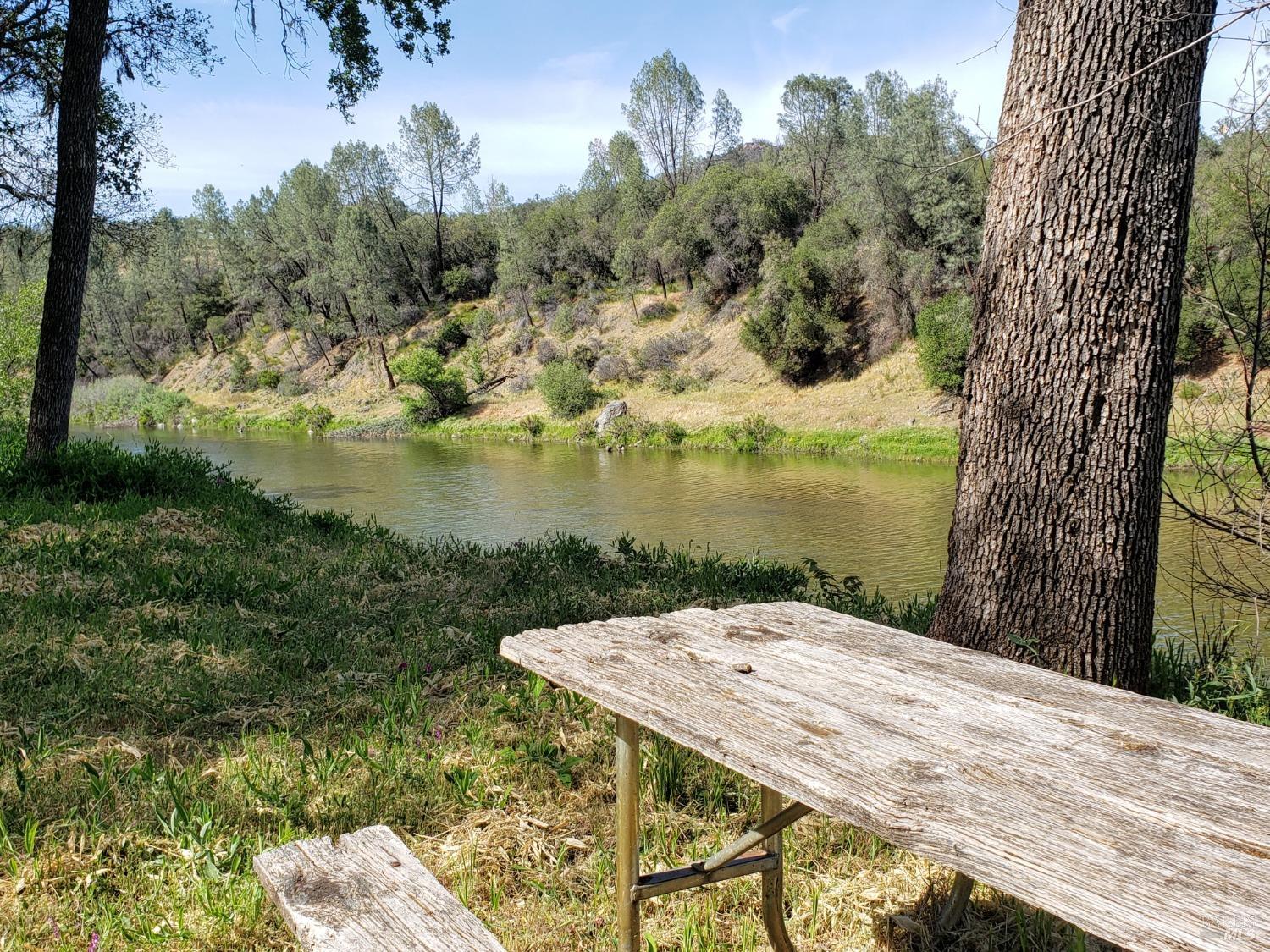 2163 Stagecoach Canyon Road Pope Valley, CA 94567 - Photo 19 of 22 a view of a lake with a mountain